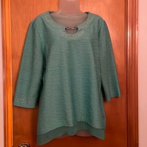 Textured teal top with silver embellishments and sheer trim bottom